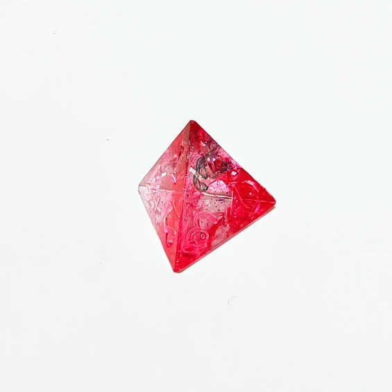 d4, pink with red metallic flakes, slight blue bleed, minor bubbles
